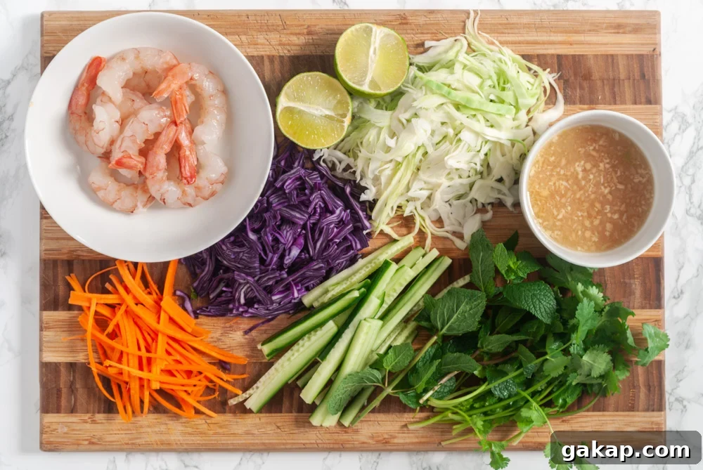ingredients for Vietnamese shrimp salad chopped on a cutting board