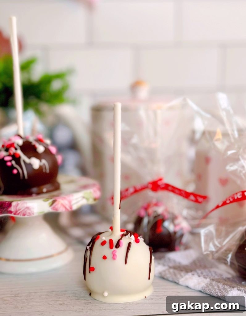 Red Velvet Cake Pops: Simple Party Dessert Recipe 9 Dipped cake pops.