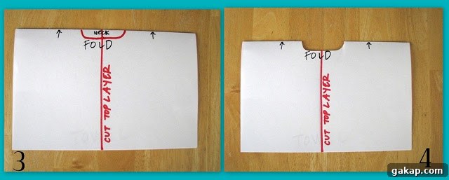 template showing how to fold towel and cut opening for head