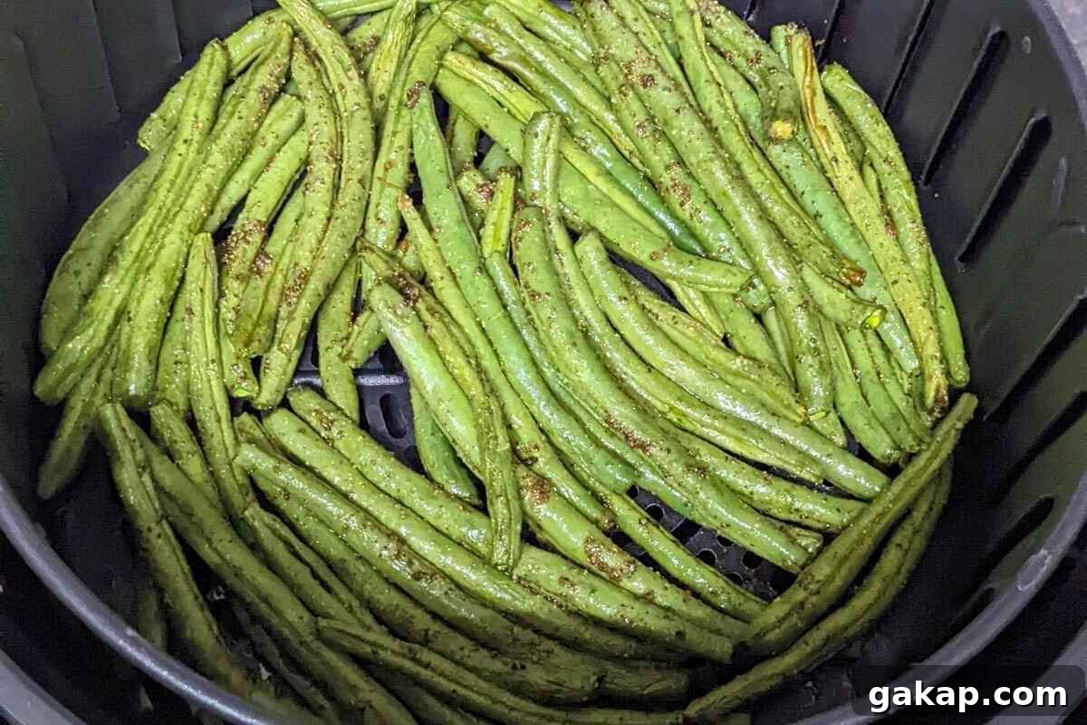 Holiday Air Fryer Recipes to Simplify Your Cooking 12 Green beans in air fryer basket