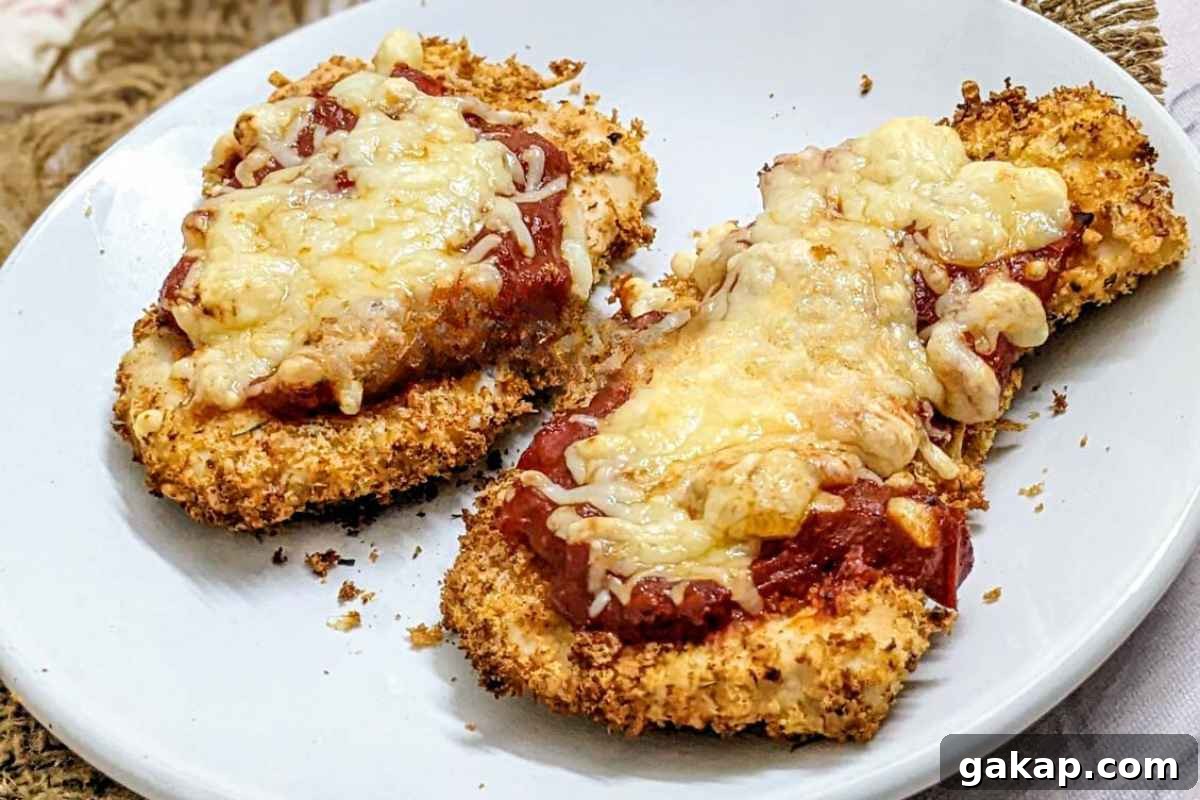 Holiday Air Fryer Recipes to Simplify Your Cooking 3 2 chicken parmesan on a plate