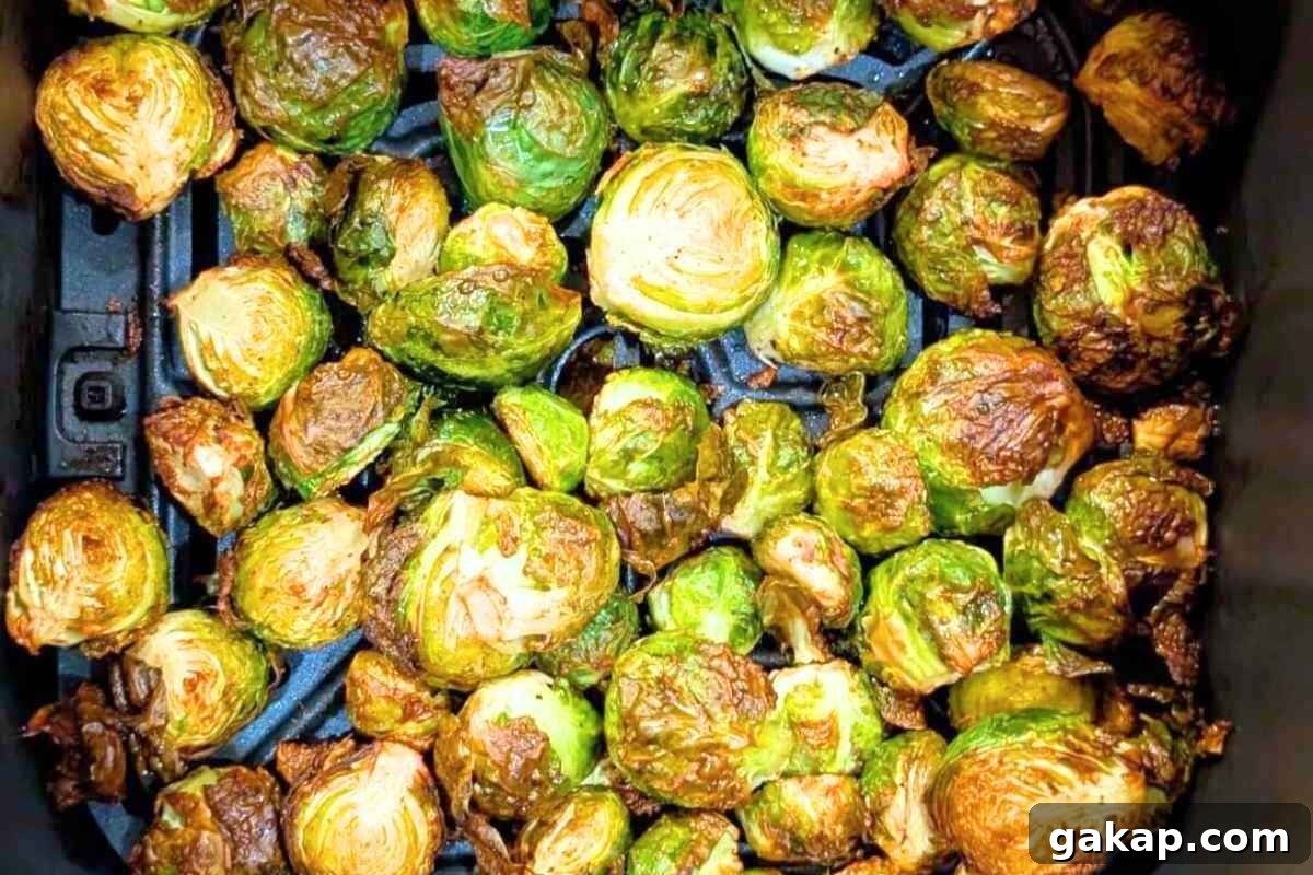 Holiday Air Fryer Recipes to Simplify Your Cooking 6 Brussels sprouts in air fryer basket