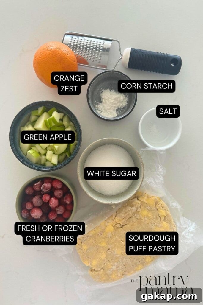 Apple Cranberry Sourdough Hand Pies Recipe for Flaky Pastries 4 Flat lay of ingredients necessary to make sourdough apple and cranberry hand pies.