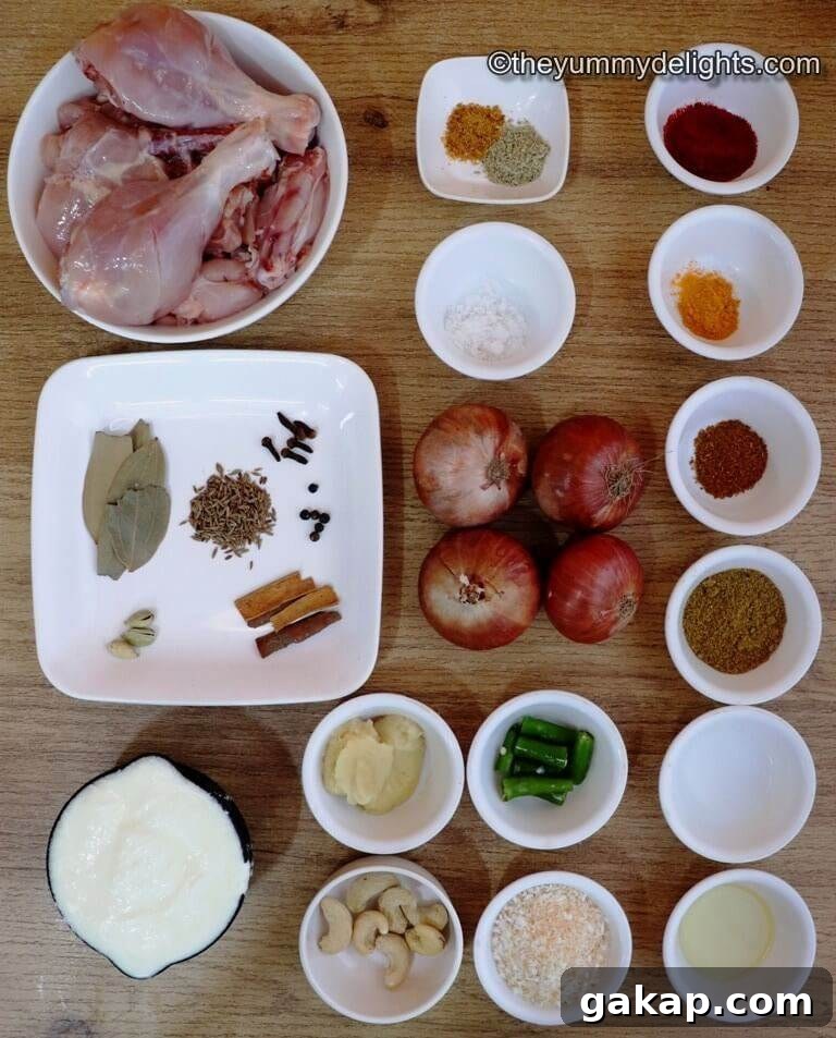 ingredients to make authentic Hyderabadi chicken korma recipe are laid out on a table