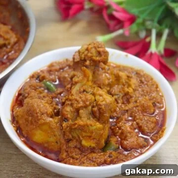 chicken changezi served in a white bowl.