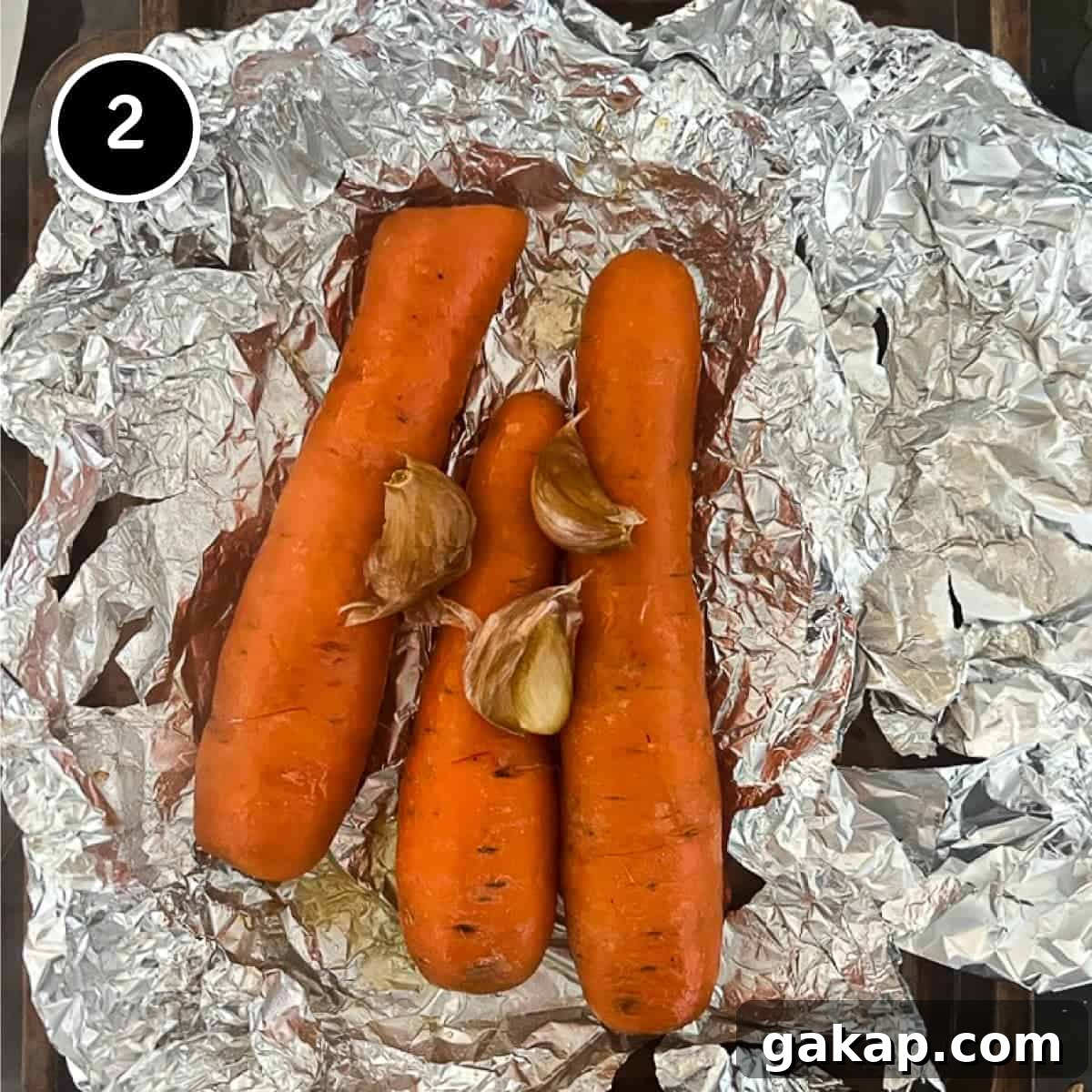 Roasted carrots and garlic in foil