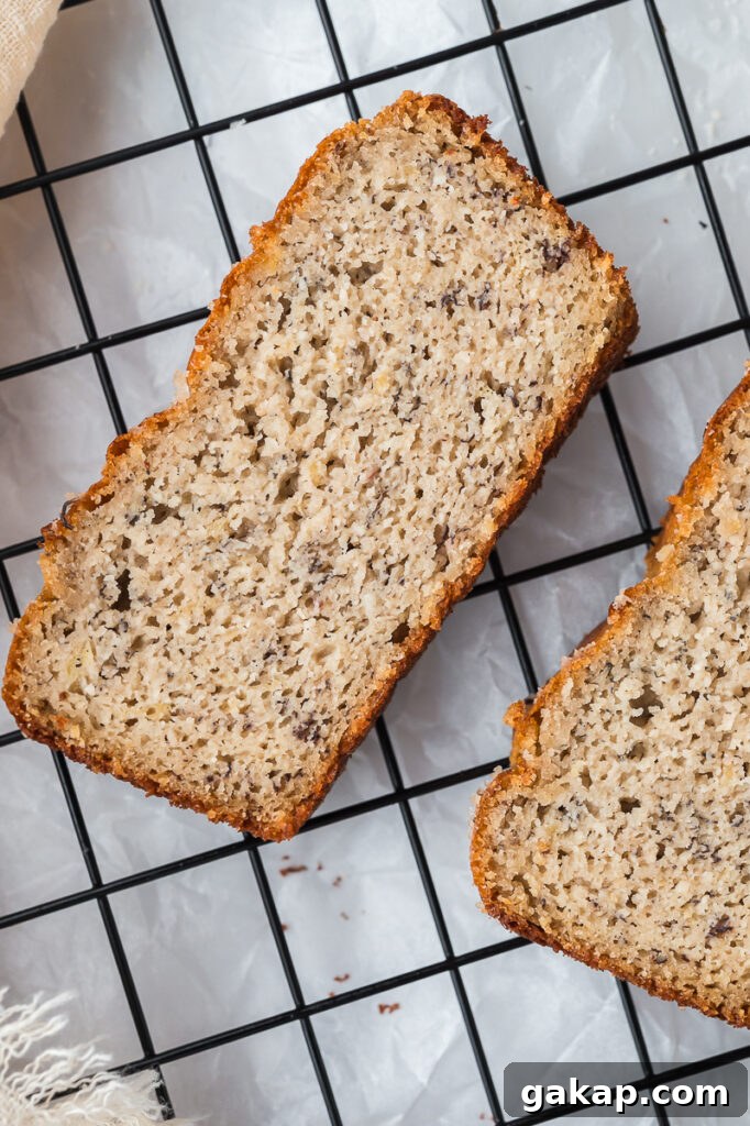 Multiple slices of almond flour banana bread arranged to show the soft texture and golden crust.