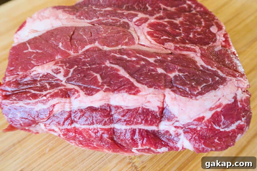 Mexican Shredded Beef Recipe for Crock Pot or Instant Pot 6 chuck roast used for Mexican Shredded Beef (Easy, Crock Pot or Instant Pot Recipe)
