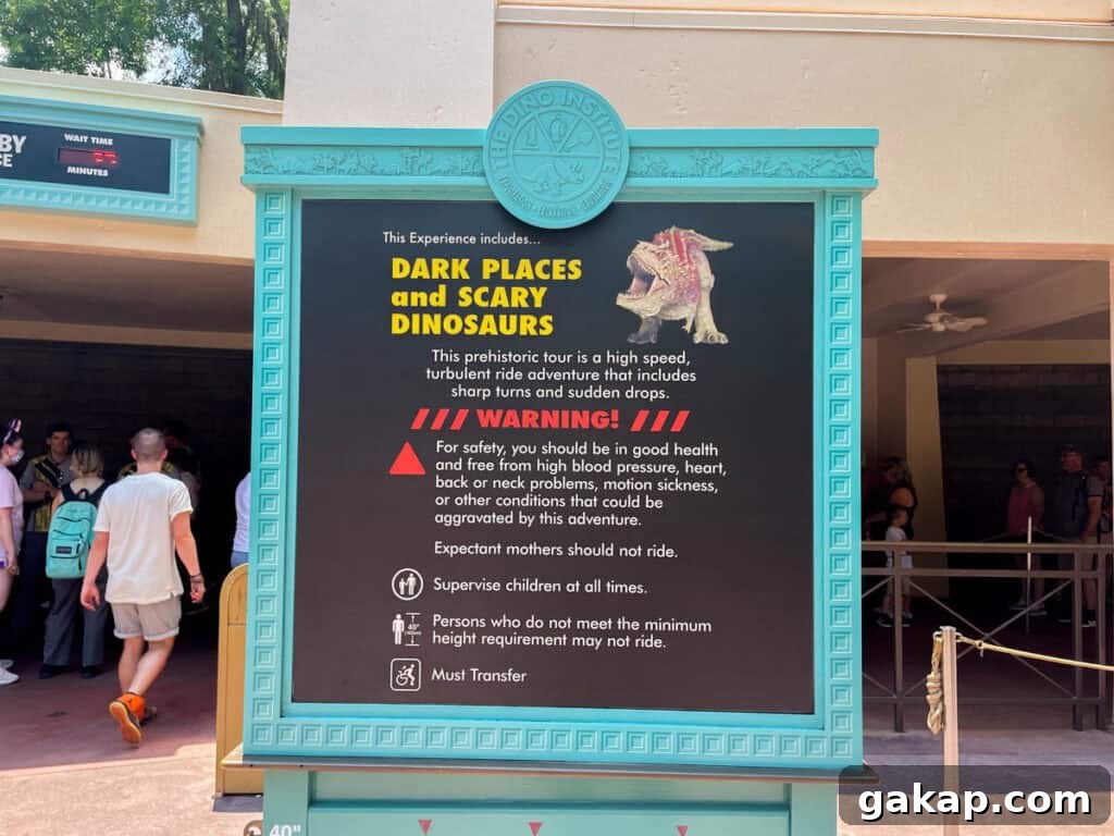 warning sign for Dinosaur ride.