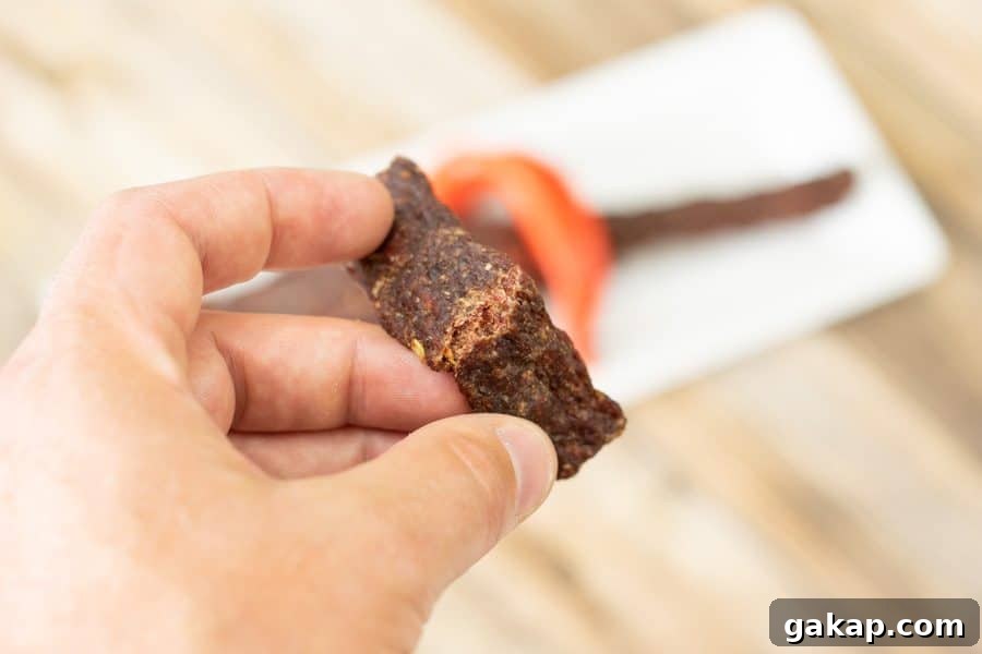 Spicy Fiery Ground Beef Jerky Recipe 15 Bending jerky strip to see if it is finished