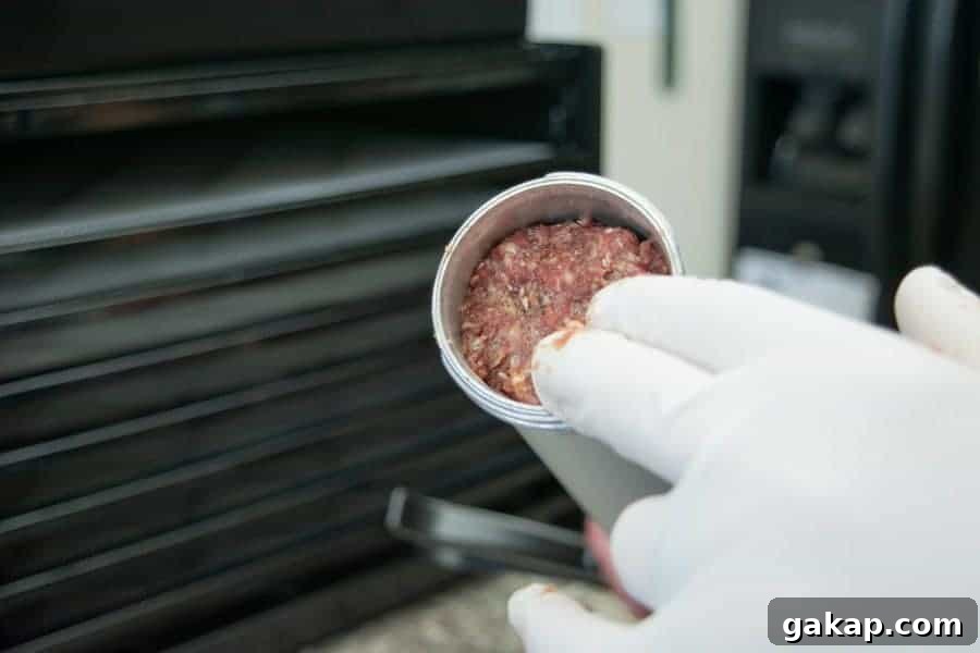 Spicy Fiery Ground Beef Jerky Recipe 10 loading jerky gun with ground beef
