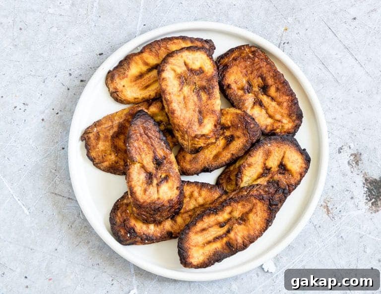 close of of horizontal image of plantains in air fryer