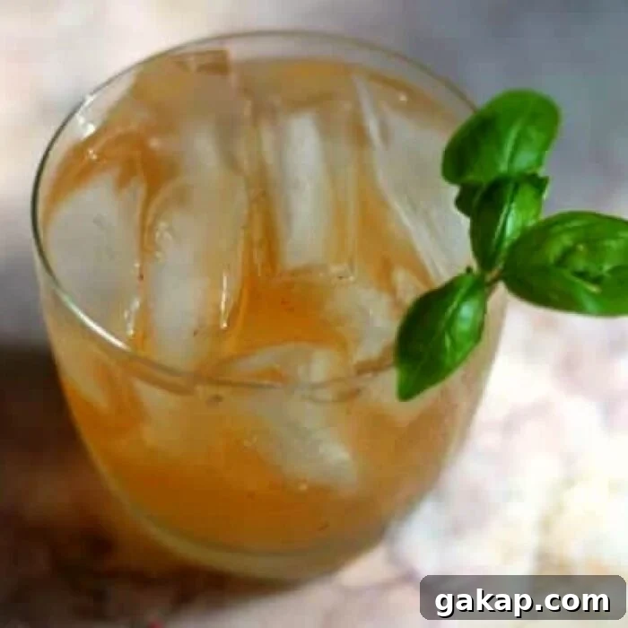 Overhead view of a tequila and ginger ale cocktail.