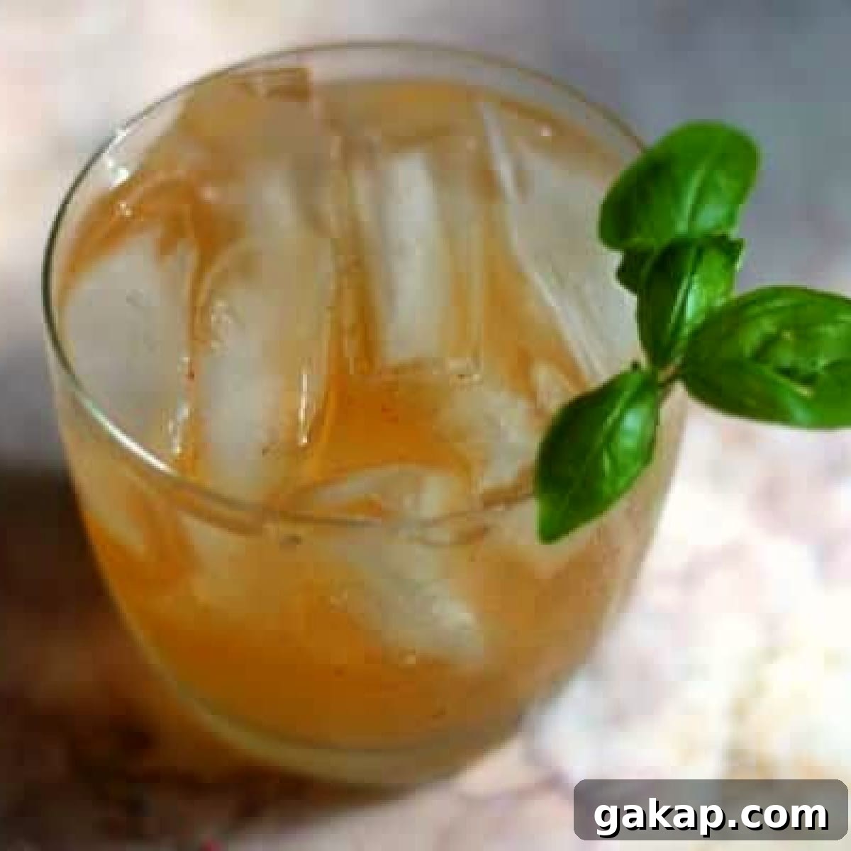 Overhead view of a tequila and ginger ale cocktail.