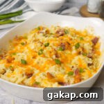 Smoked cheesy Potatoes in white baking dish