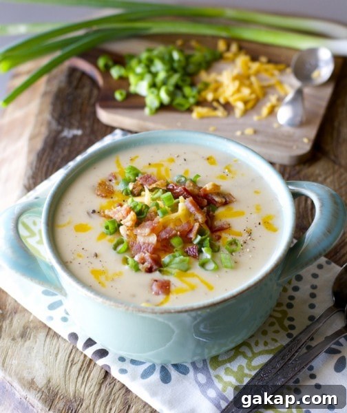 Easy Potato Soup! Top with bacon cheddar and green onions for the ultimate comfort food! 