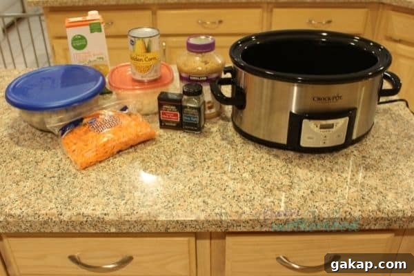 Creamy Slow Cooker Chicken and Potato Chowder 2 Crockpot and the initial ingredients that go into the slow cooker in the morning to make slow cooker chicken potato chowder