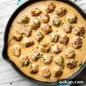 Classic Swedish Meatballs Recipe: Creamy Sauce & Lingonberry Pairing 11 Swedish meatballs in a skillet
