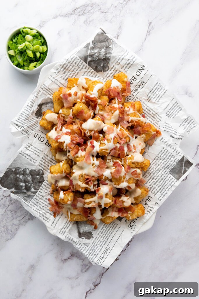 Loaded Tater Tots Recipe: Crispy, Cheesy Potato Bites 5 tater tots with sour cream and bacon