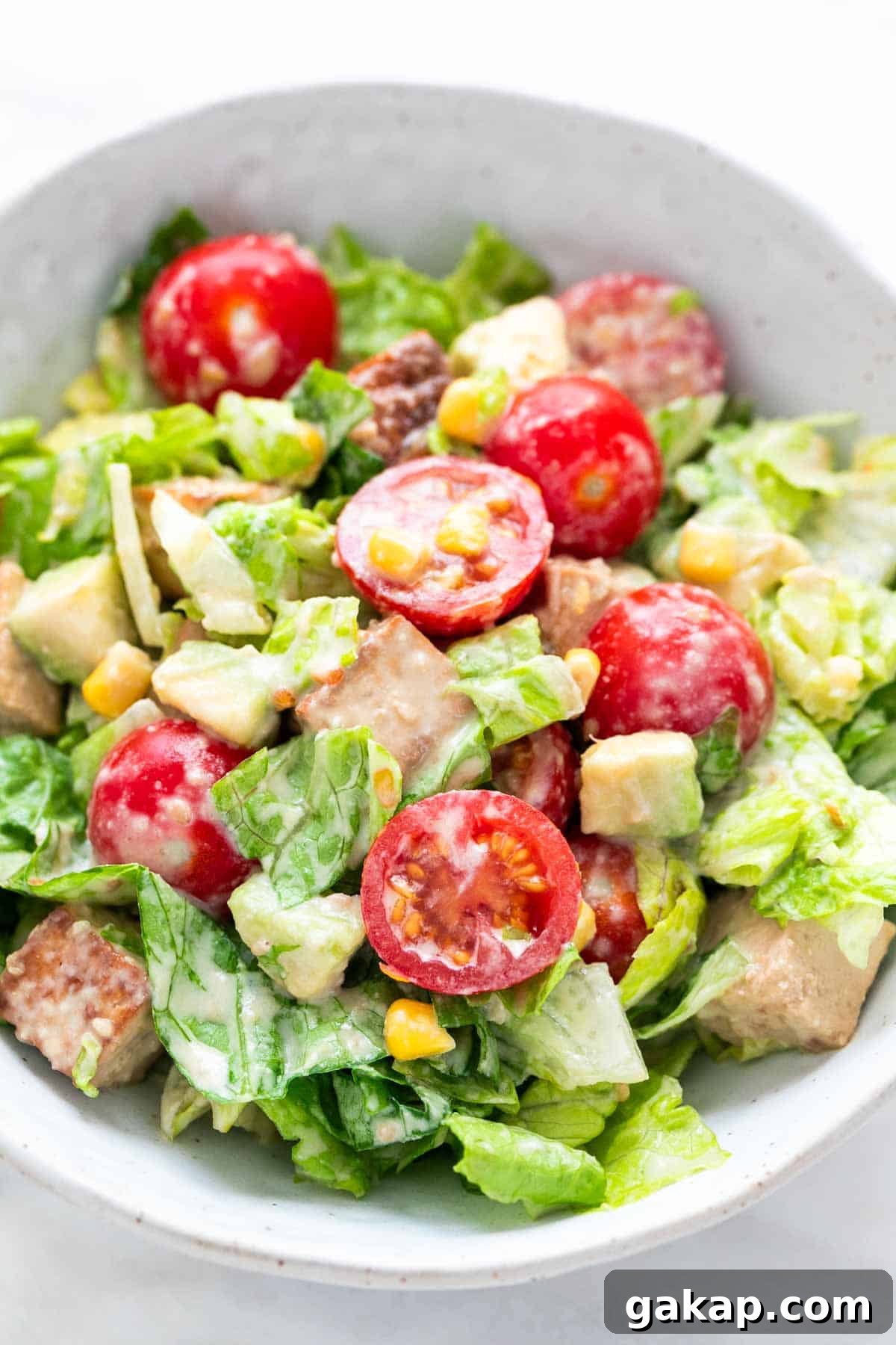 Bowl with marinated tofu salad.