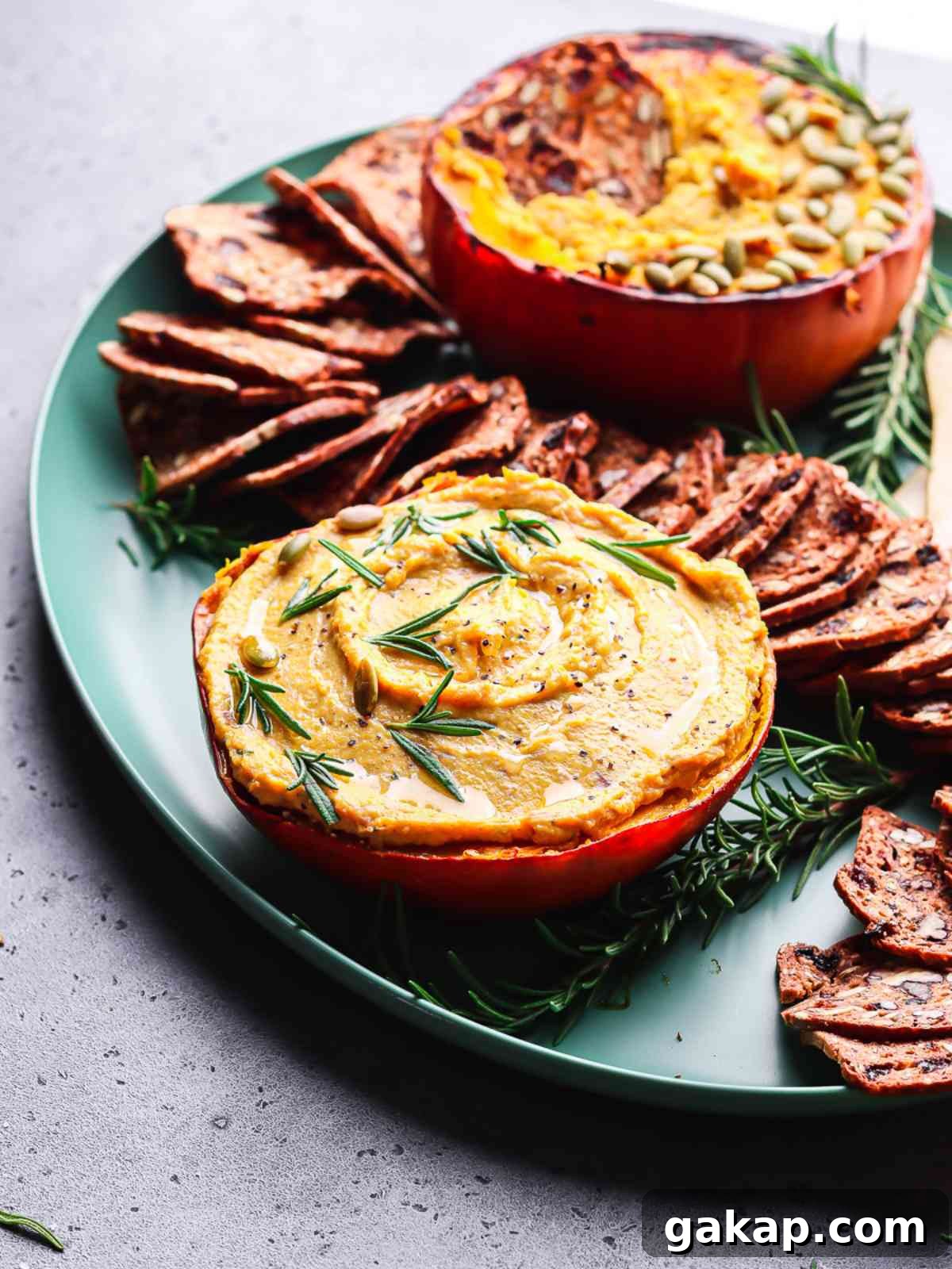 Creamy Pumpkin and Goat Cheese Dip for Fall Entertaining 6 creamy cheese and pumpkin dip on a platter.