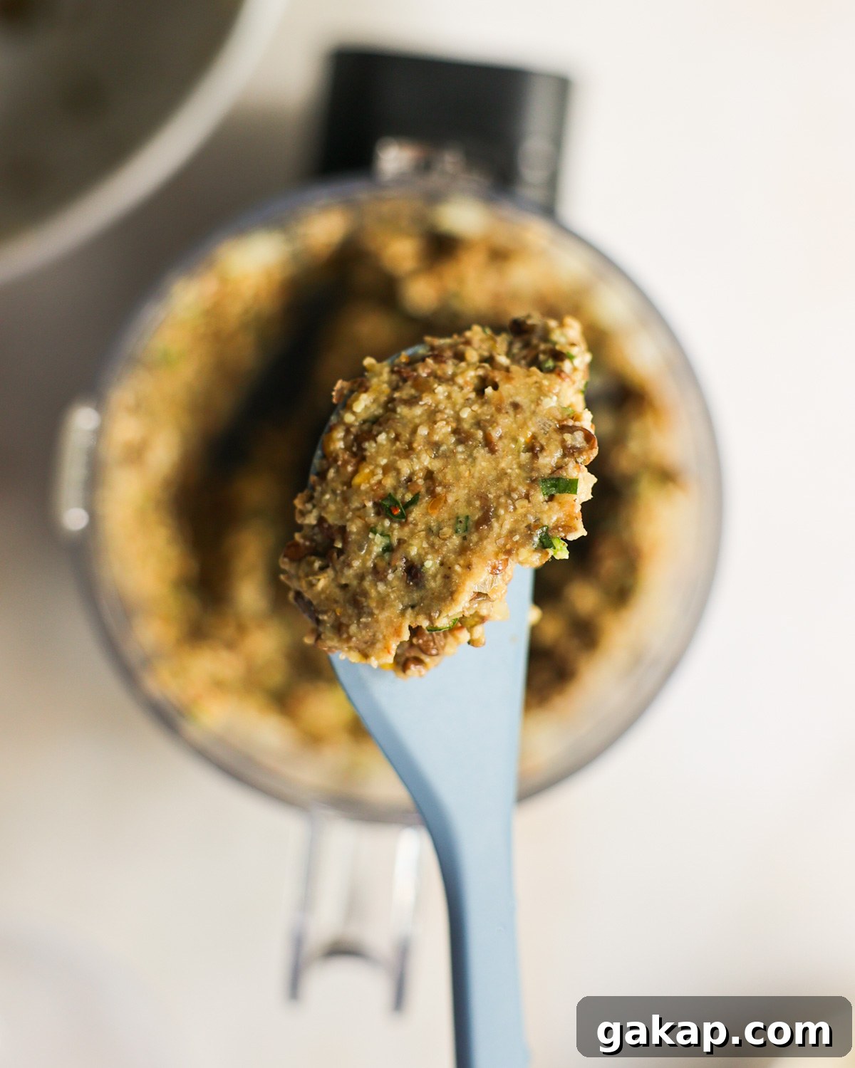 Blended batter on a spatula.