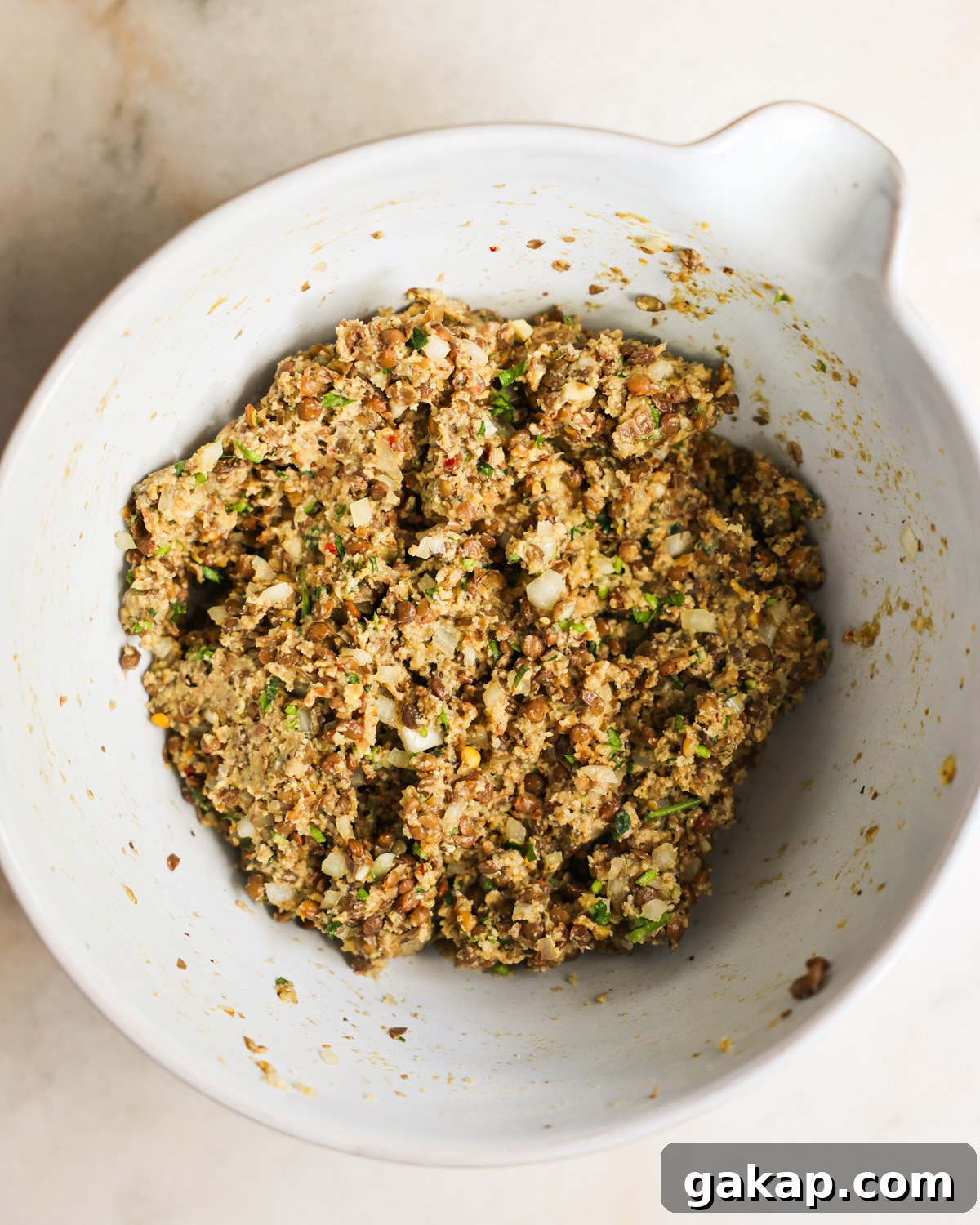 Lentil meatballs batter in a bowl.