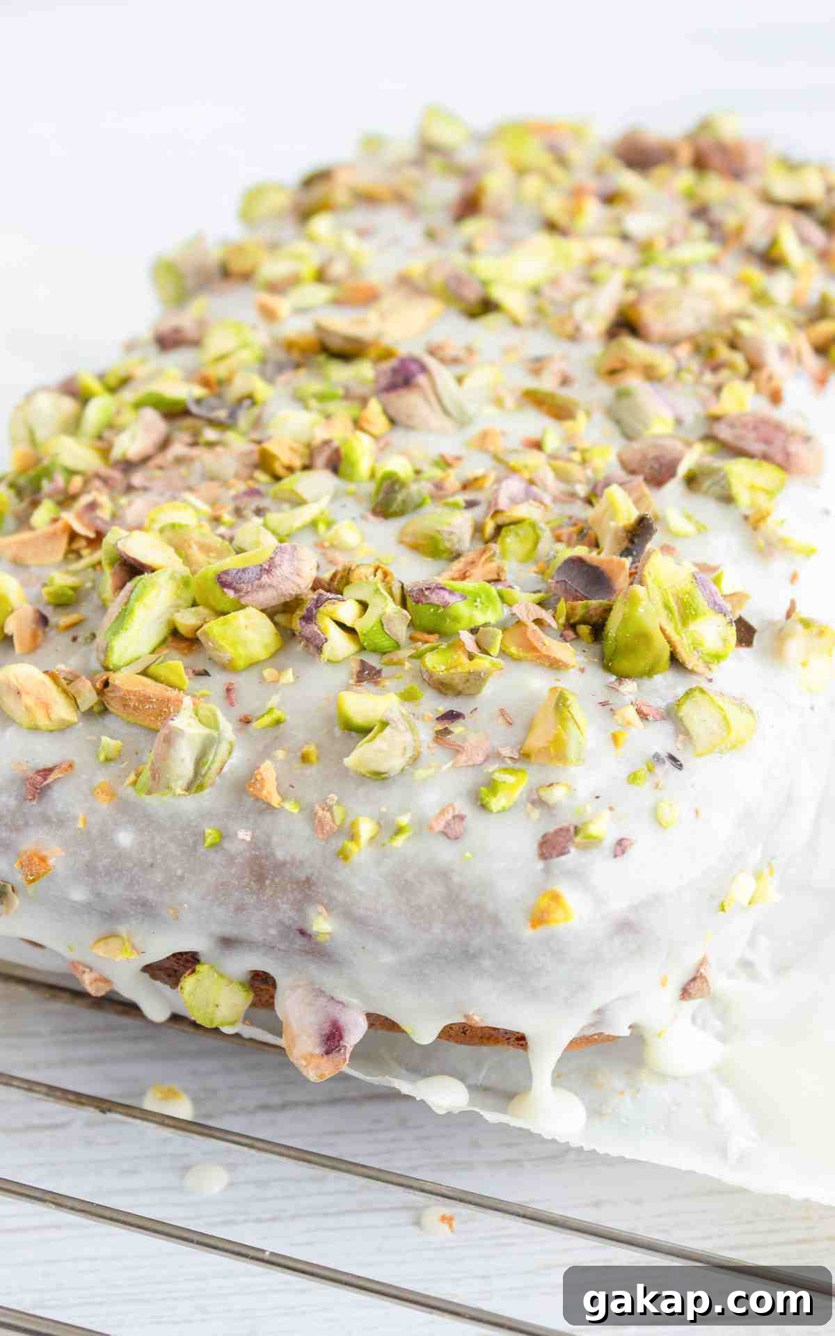 Pistachio Quick Bread Recipe: Moist Loaf with Crunchy Nuts 6 Pistachio bread with almond glaze and crushed pistachios.