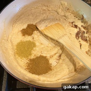 Black Pepper Paneer (Paneer Kali Mirch) — Spicy Indian Cottage Cheese 14 ground spices added to a pan with ground paste