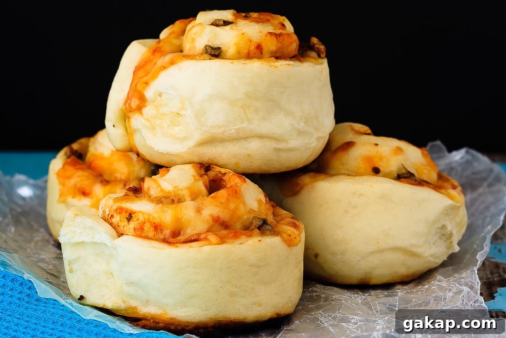 Crispy Pepperoni Pizza Rolls Recipe: Homemade Snack Idea 2 Pepperoni Pizza Rolls - Quick and easy homemade pizza rolls - hot, cheesy, pizza rolls that the whole family will love. Plus, they freeze well for ready made lunches!