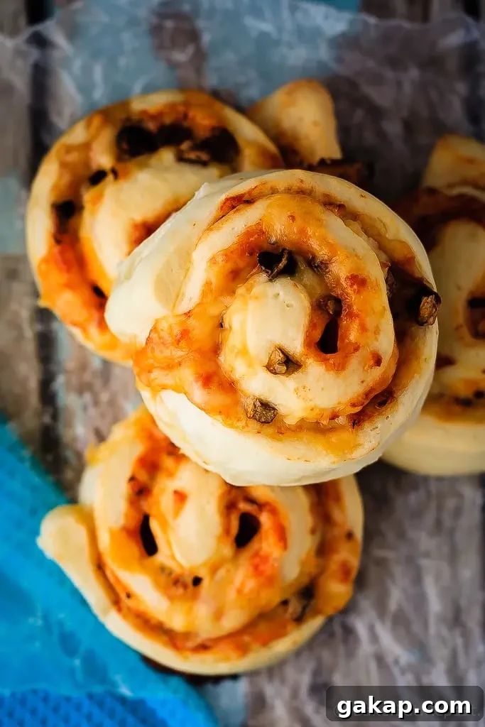 Crispy Pepperoni Pizza Rolls Recipe: Homemade Snack Idea 4 Pepperoni Pizza Rolls - Quick and easy homemade pizza rolls - hot, cheesy, pizza rolls that the whole family will love. Plus, they freeze well for ready made lunches!