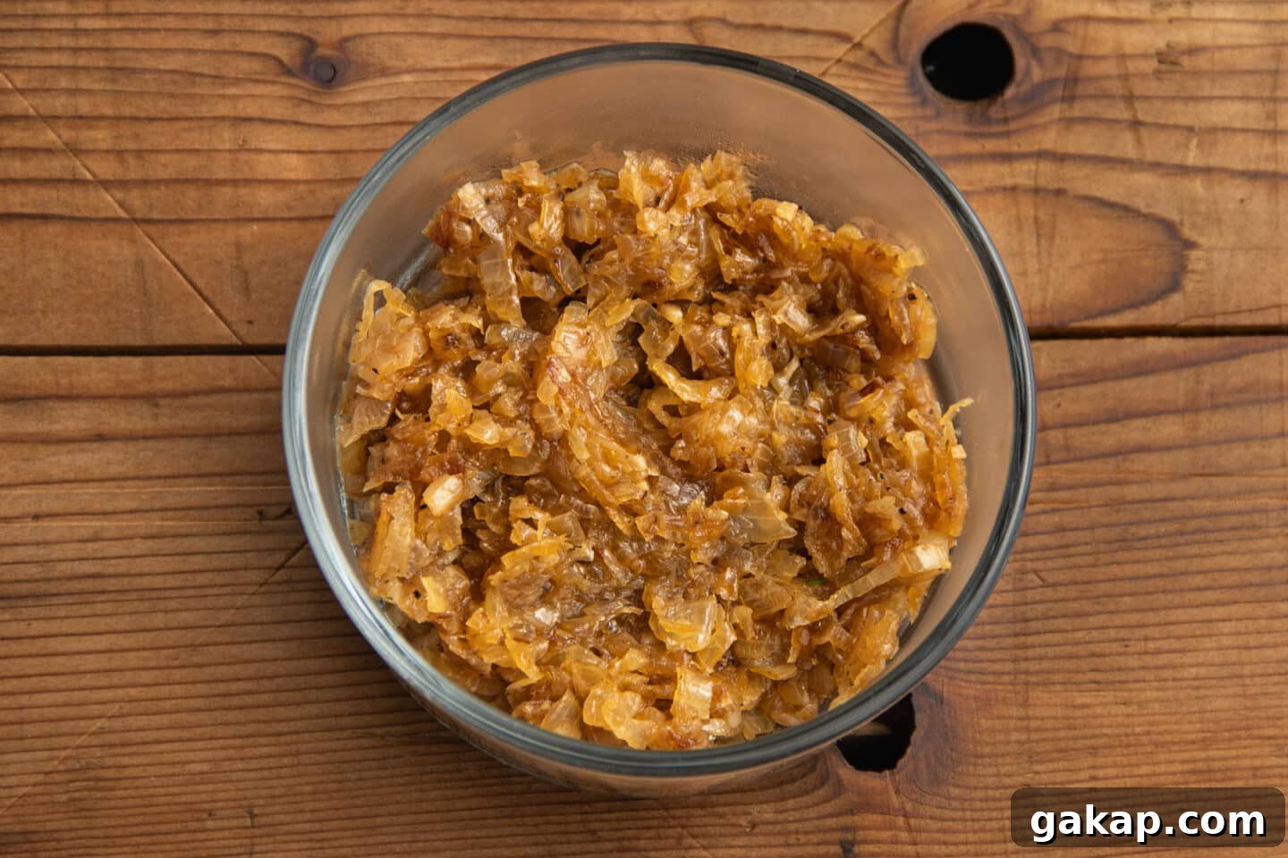 This is a picture of the cooked onions in a bowl to cool down. 