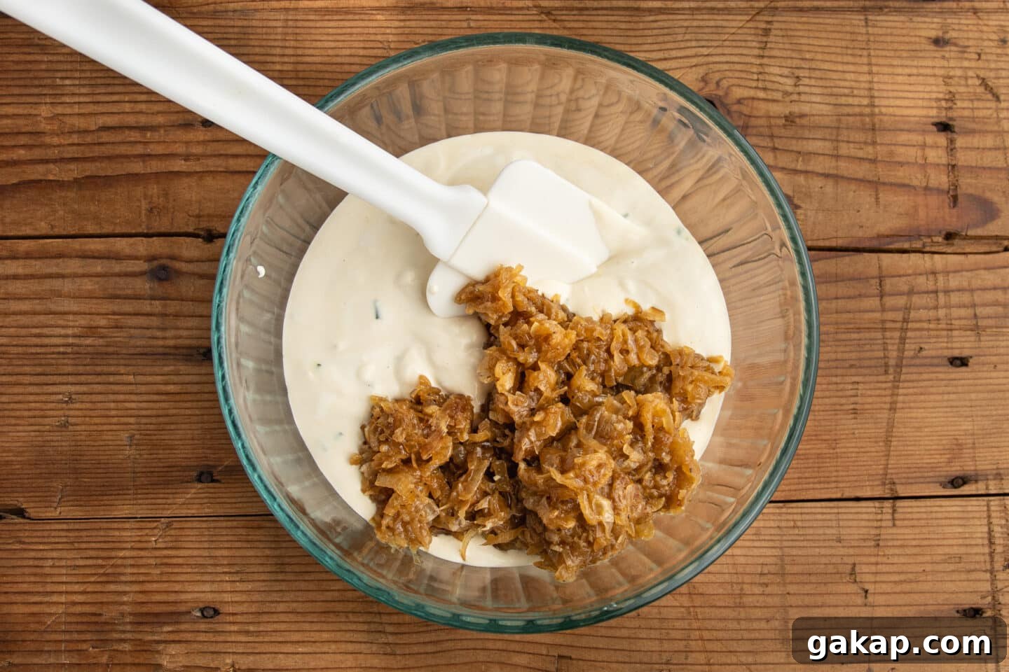 This is a picture of the cooked onions added to the greek yogurt.
