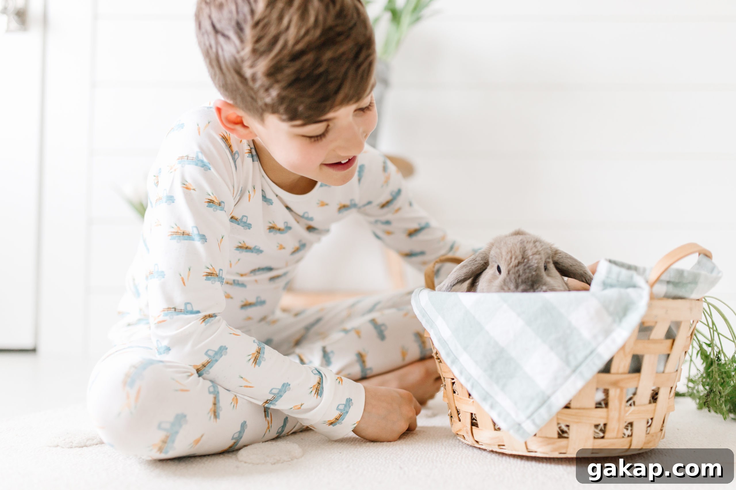 boy and easter bunny in a basket