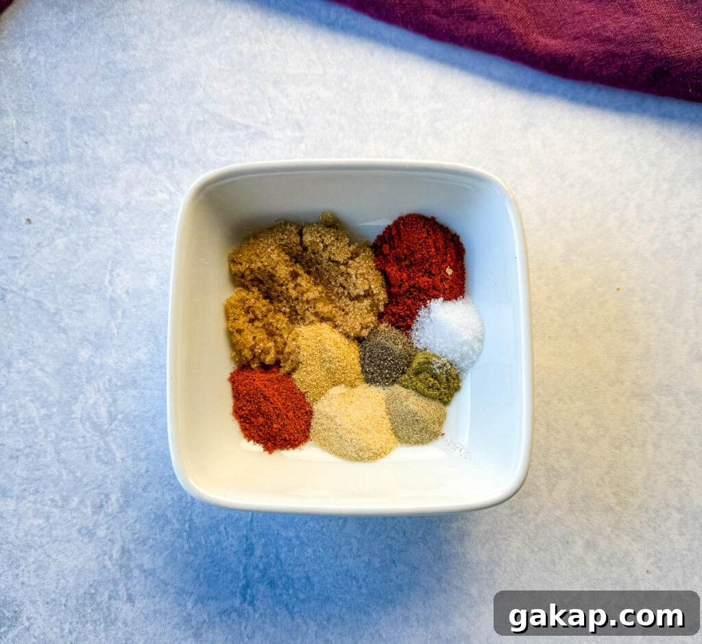 homemade Cajun rub seasonings in a white bowl