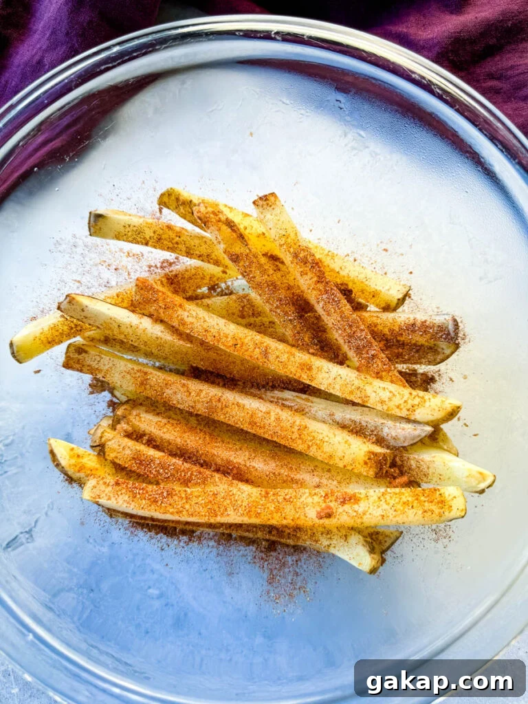 sliced potatoes with Cajun seasoning