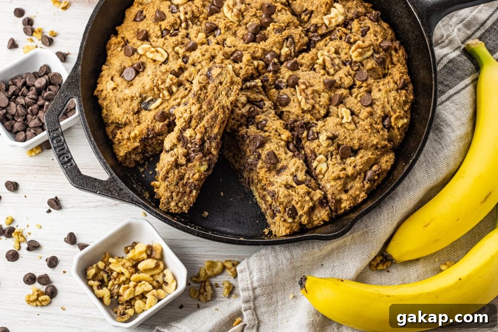 Moist Whole Wheat Banana Bread with Walnuts and Cinnamon 3 cast iron pan with sliced chocolate chip walnut banana bread