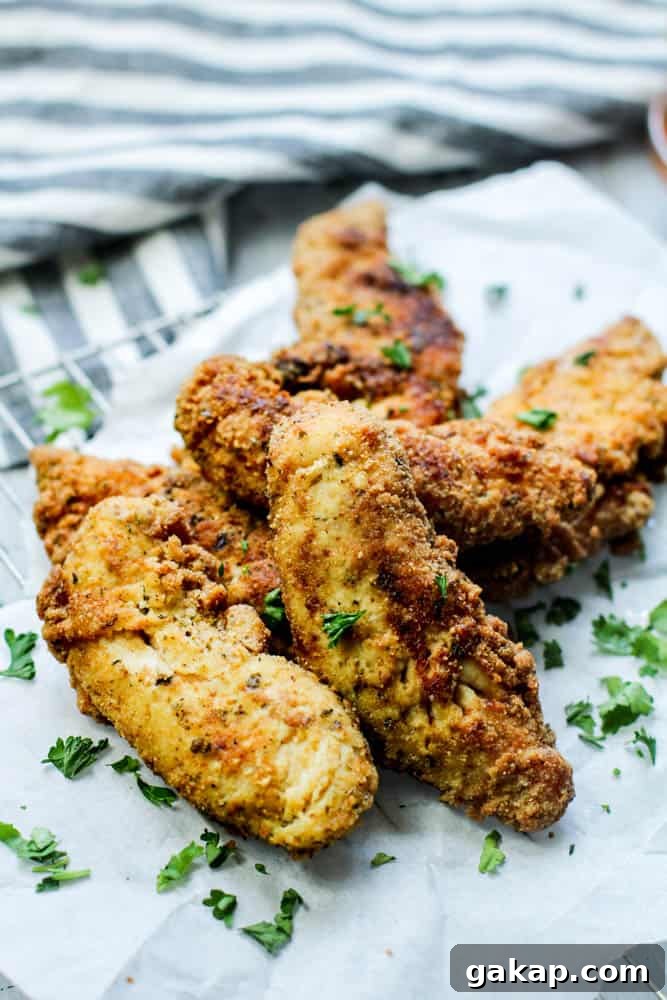 Low carb cripsy chicken tenders with parsley garnished on top