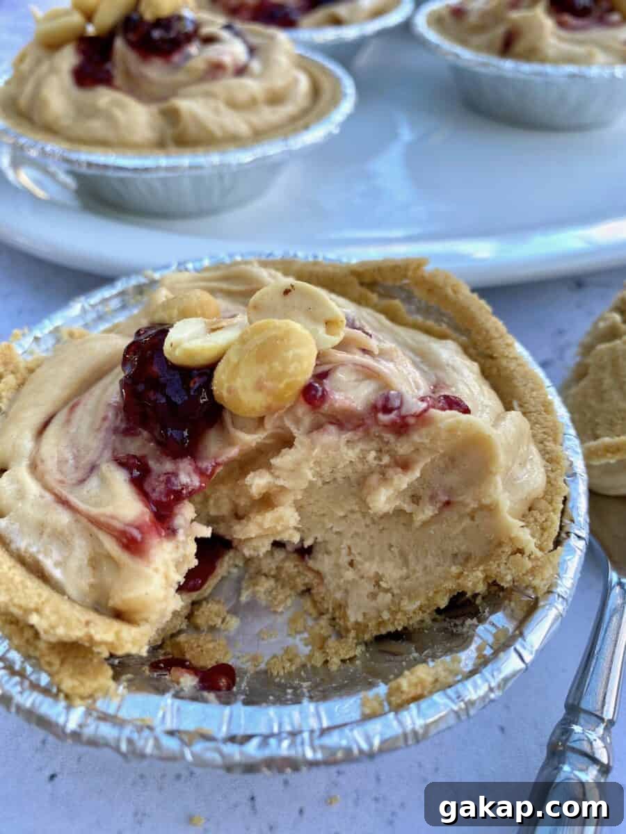 Peanut butter pie in a small dish with a scoop taken out