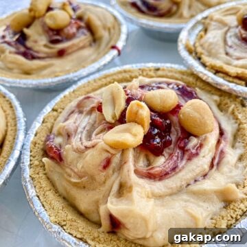 Small peanut butter pies assembled on a counter.