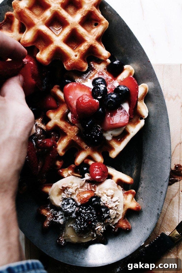 Homemade Easy Belgian waffles recipe with berries, granola, and yogurt