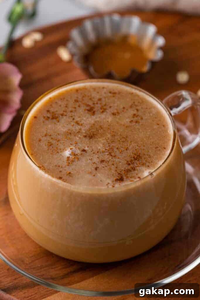 Honey Oatmilk Latte Recipe: Hot & Iced Starbucks-Style Guide 2 Honey oat milk latte Starbucks cpycat coffee drink served in a glass mug