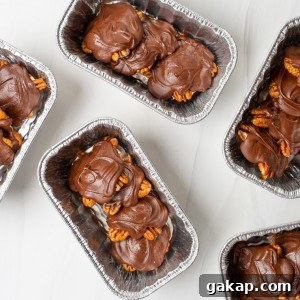 Making Chocolate Turtles couldn't be easier or more fun! They make fabulous gifting and holiday candy.  Homemade pecan turtle candies come together quickly using the microwave to melt the caramel and chocolate.