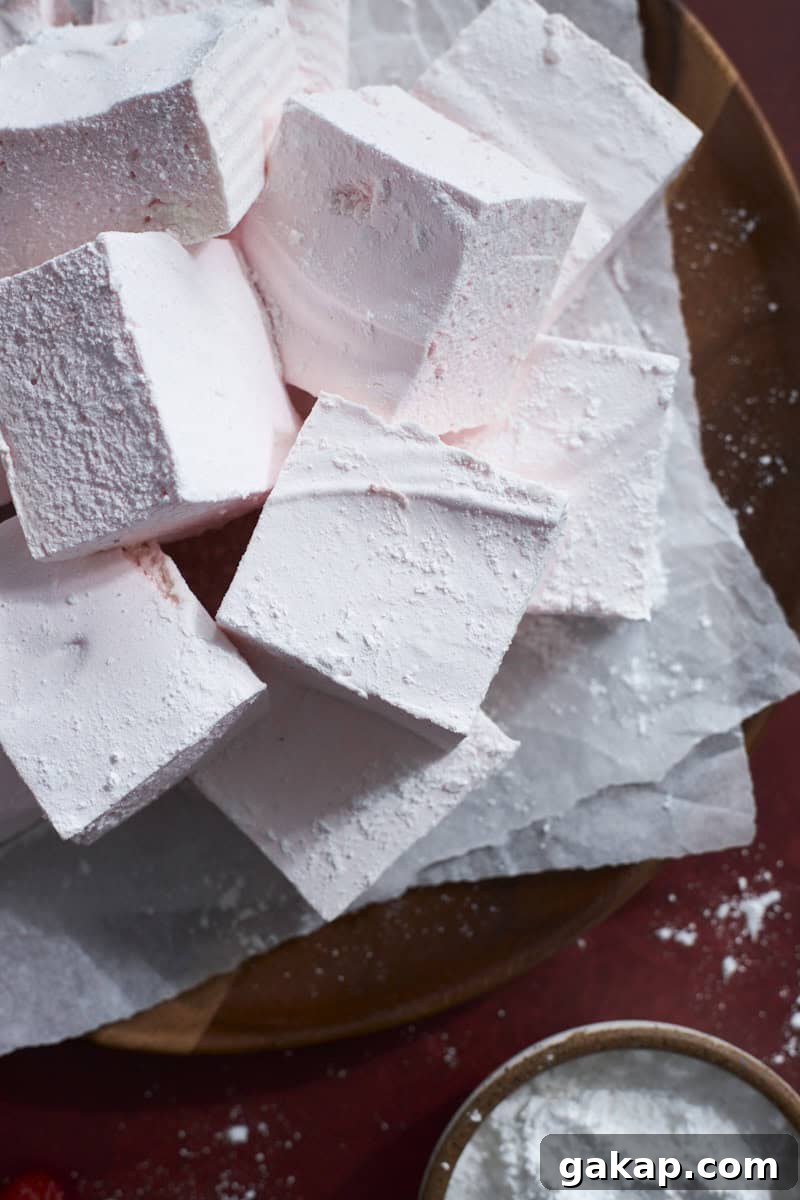 A closeup of Strawberry Pink Marshmallows on a tray.