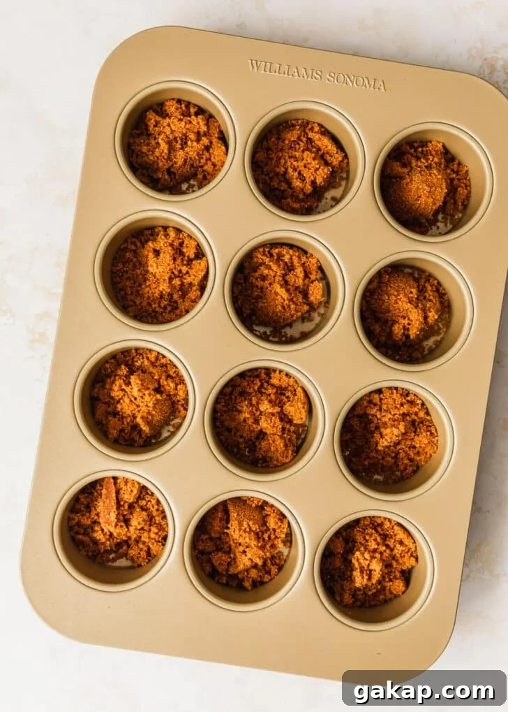 A mini cheesecake pan with graham cracker crust.
