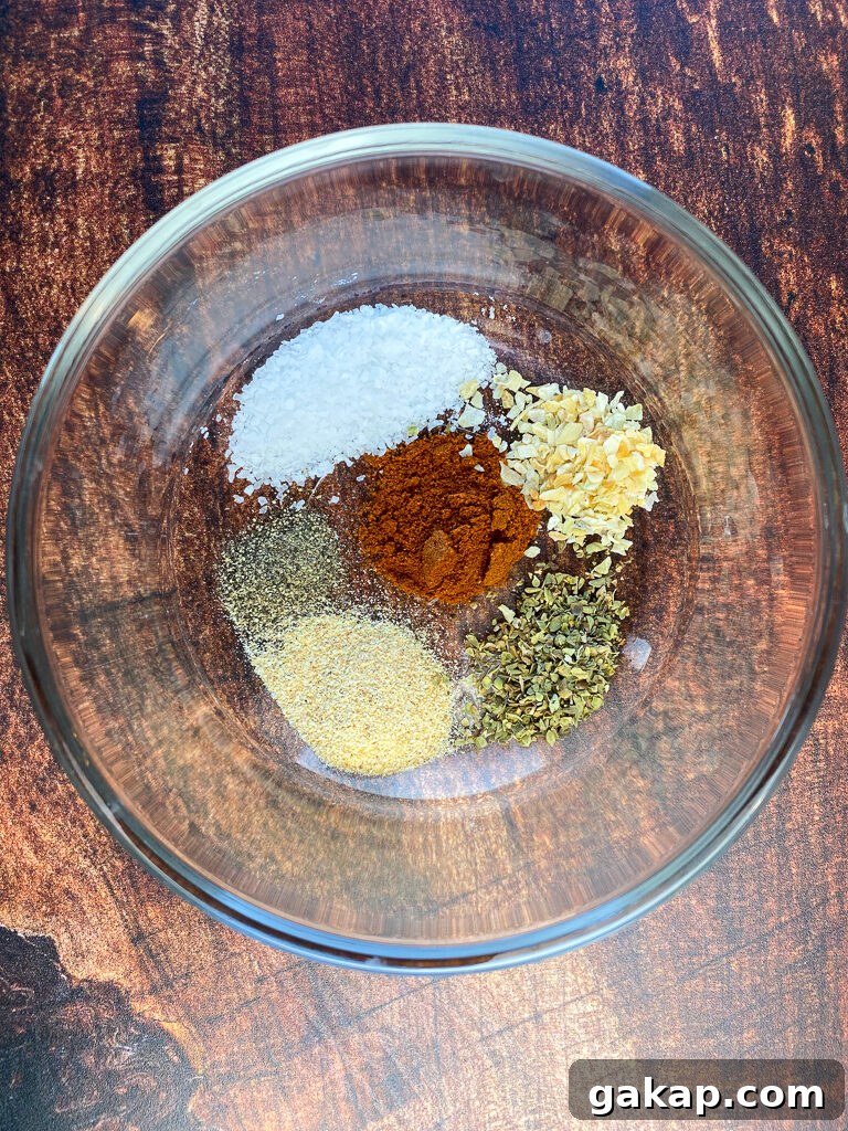 Simple seasonings in a glass bowl to season pork chops