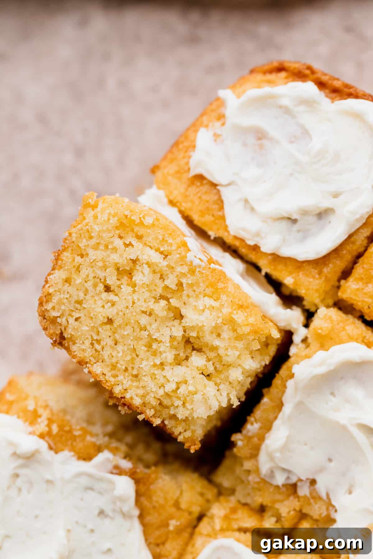 A piece of honey butter cornbread on its side.