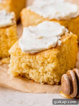 Honey butter cornbread with butter on top.