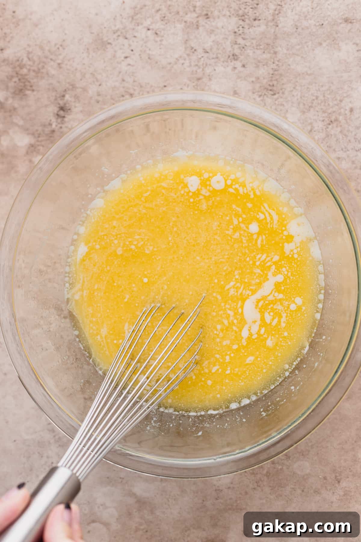 Wet ingredients in a bowl.