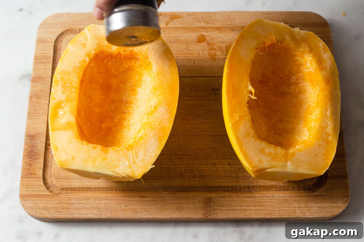 Crispy Air-Fried Spaghetti Squash Recipe for Quick Dinners 7 adding salt to the spaghetti squash.